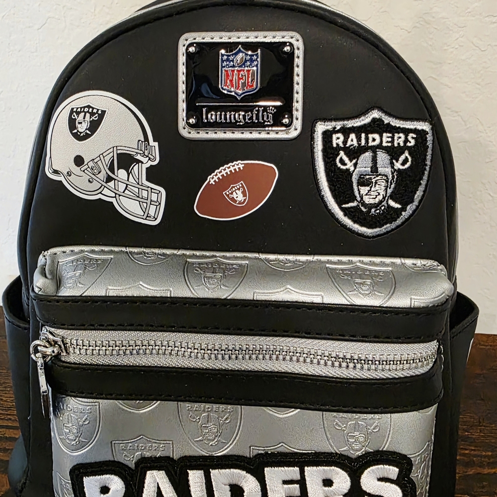 Loungefly Raiders Black and Silver Backpack